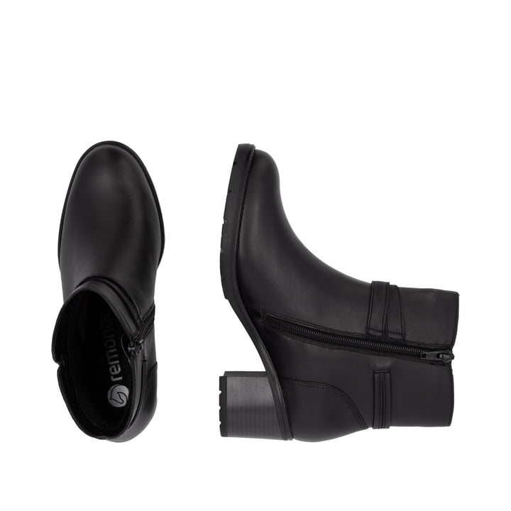 Schwarze remonte Damen Stiefeletten D2A73-00 mit einem Reißverschluss. Schuh von oben, liegend.