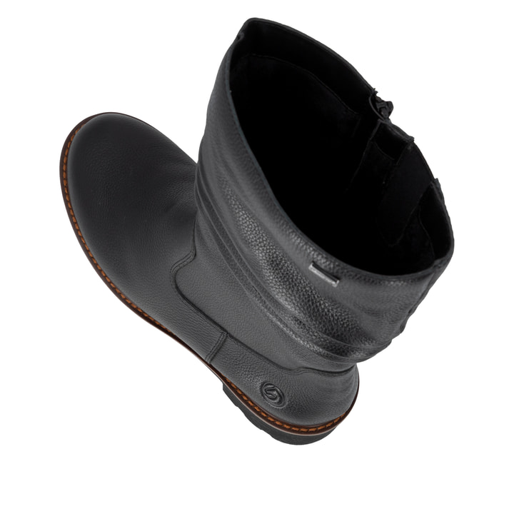 Schwarze remonte Hochschaftstiefel D0A75-01 mit wasserabweisender TEX-Membran. Schuh von oben, liegend.