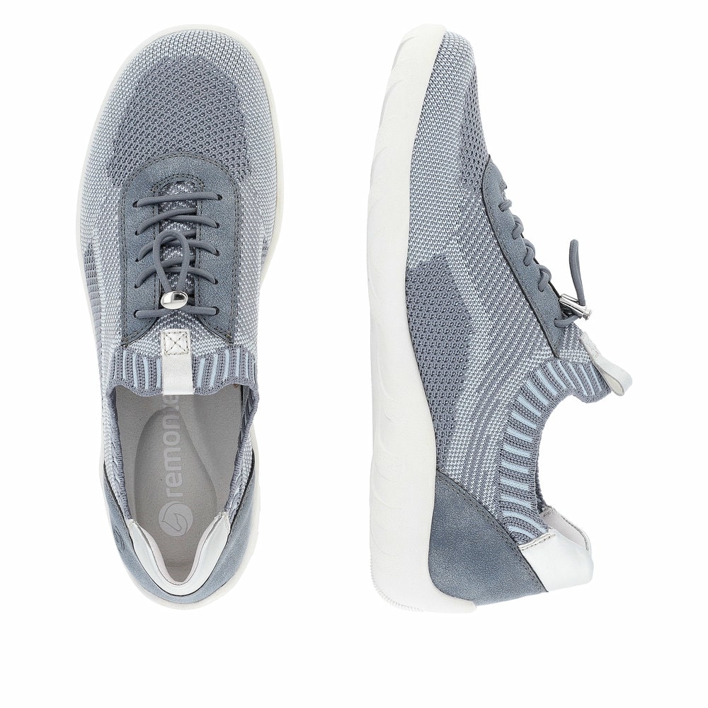 Blaue remonte Damen Slipper R3518-15 mit einem Gummizug sowie der Komfortweite G. Schuh von oben, liegend.