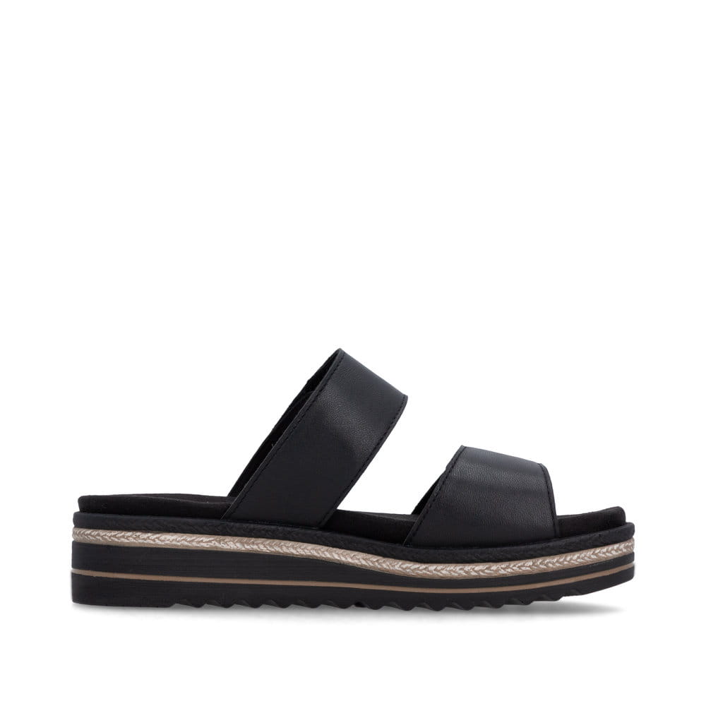 Mules remonte noires pour femme D0Q64-00 avec fermeture velcro. Côté intérieur de la chaussure.