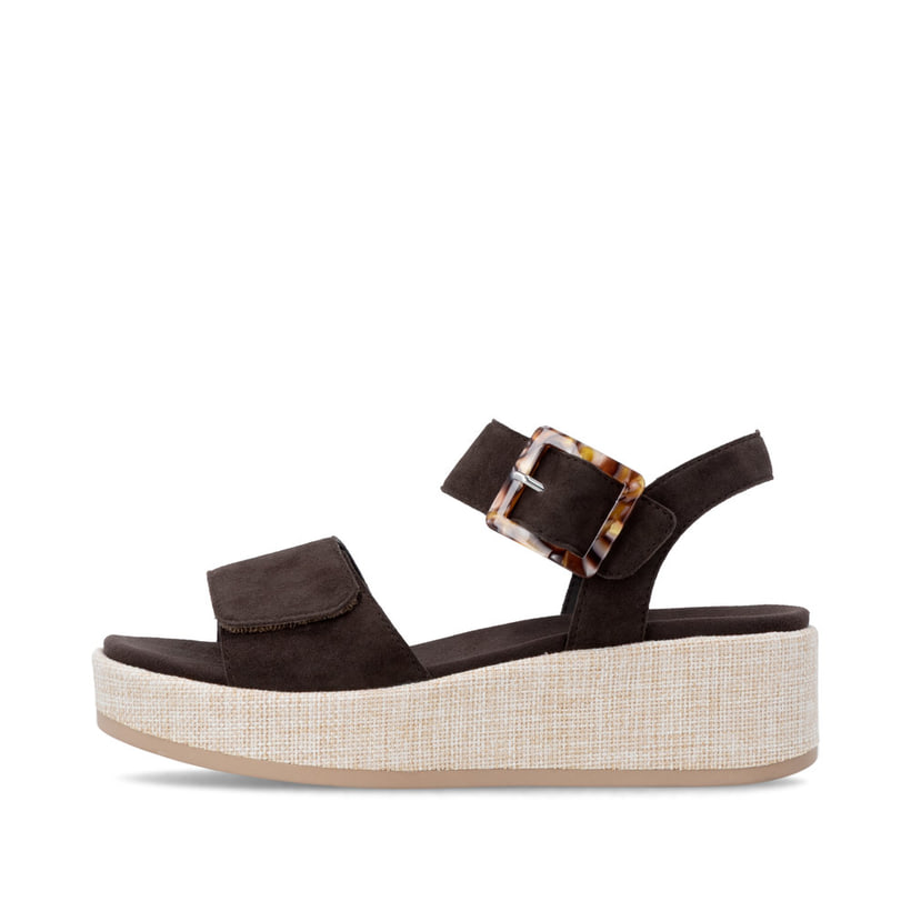 Dunkelbraune remonte Keilsandaletten D1N54-25 mit einem Klettverschluss. Schuh Außenseite.