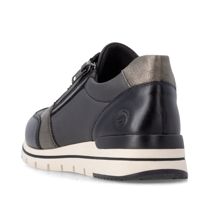 Baskets basses remonte noires pour femmes R6700-04 avec fermeture éclair. Chaussure vue de l'arrière.