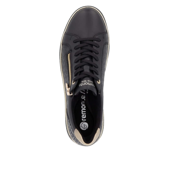 Baskets basses remonte noires pour femme D2E00-03 avec fermeture éclair. Semelle extérieure de la chaussure.