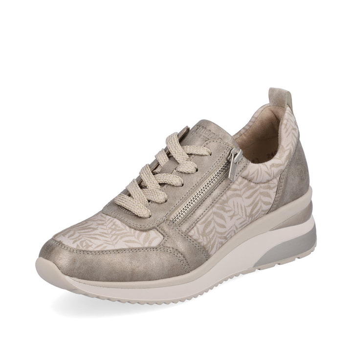 Vanillefarbene remonte Damen Sneaker D2401-60 mit einer flexiblen Sohle mit Keilabsatz. Schuh seitlich schräg