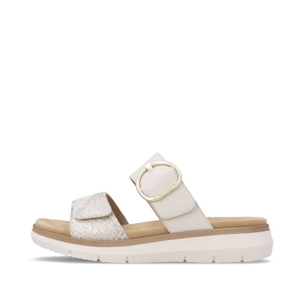 Mules remonte beiges pour femme D2K57-60 avec boucle tendance. Côté extérieur de la chaussure.
