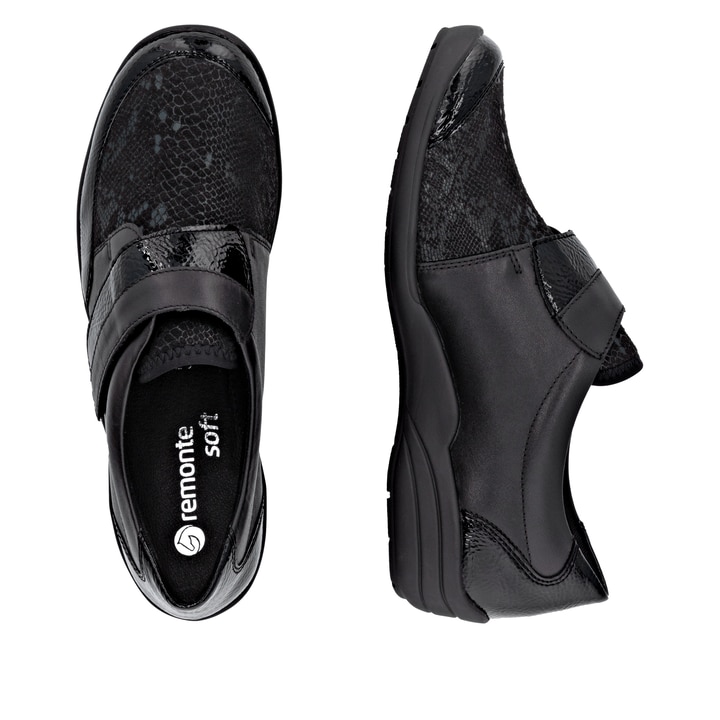 Schwarze remonte Damen Slipper R7600-00 mit Klettverschluss sowie Extraweite H. Schuh von oben, liegend.