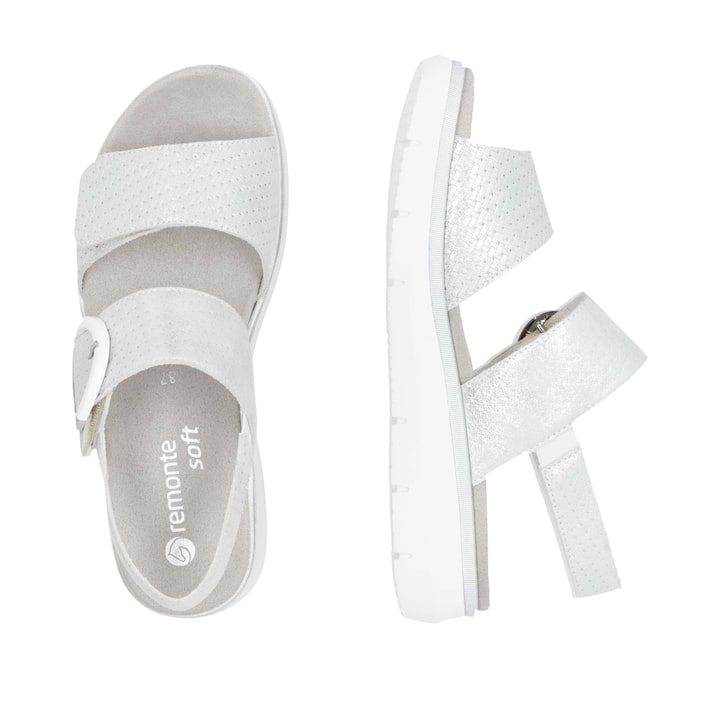 Silberne remonte Keilsandaletten D2K50-91 mit einem Klettverschluss. Schuh von oben, liegend.