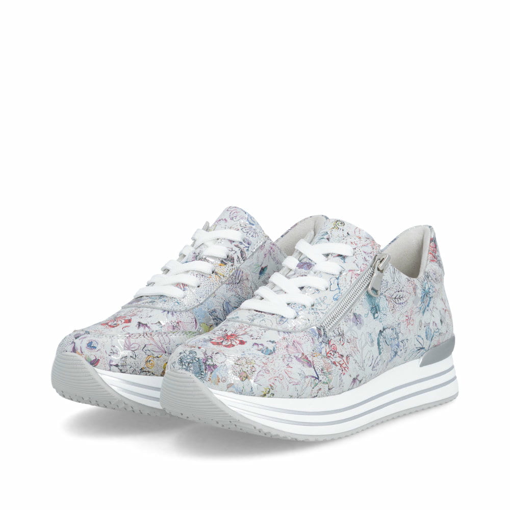 Mehrfarbige remonte Damen Sneaker Low D1326-90 mit floralem Muster. Schuhpaar seitlich schräg.
