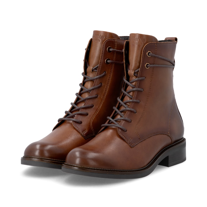 Braune remonte Damen Schnürstiefel D2W80-24 mit einem Reißverschluss. Schuhpaar seitlich schräg.