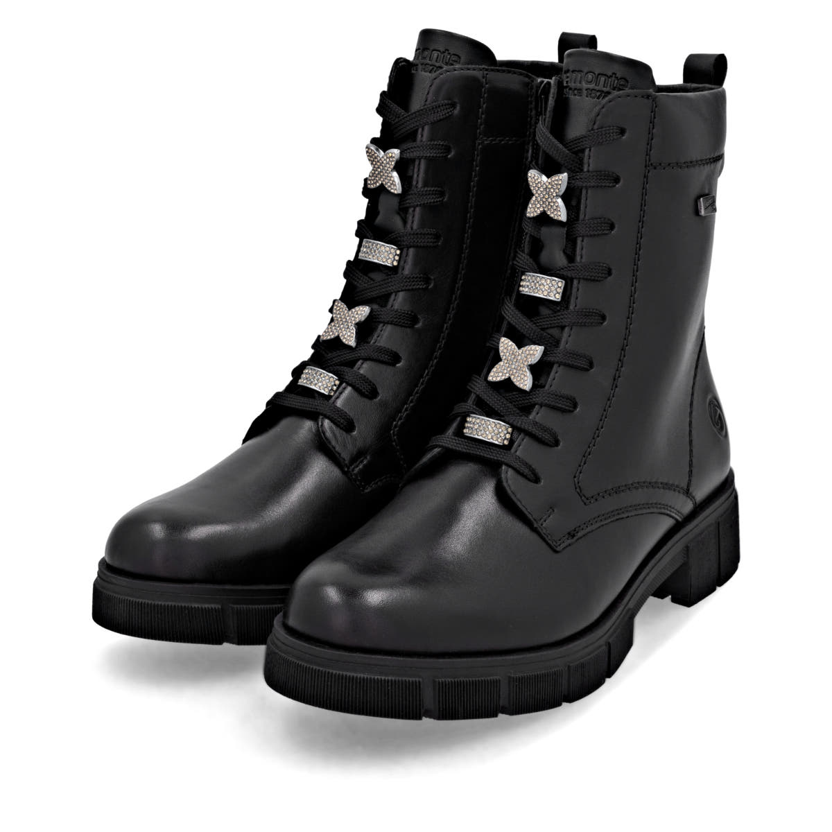 Schwarze remonte Damen Schnürstiefel D2S73-00 mit wasserabweisender TEX-Membran. Schuhpaar seitlich schräg.