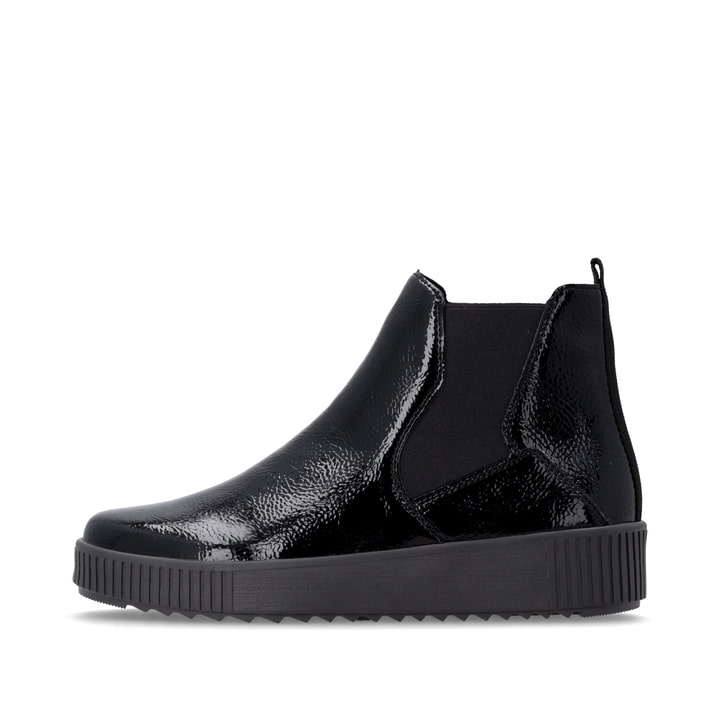 Vegane, schwarze remonte Chelsea Boots R7994-02 mit einem Reißverschluss. Schuh Außenseite.