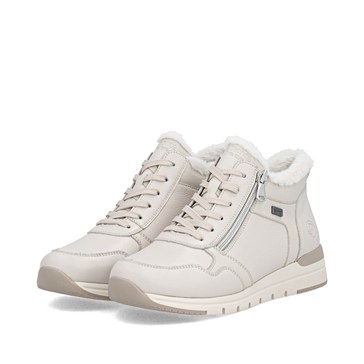 Weiße remonte Damen Schnürstiefel R6773-80 mit wasserabweisender TEX-Membran. Schuhpaar seitlich schräg.