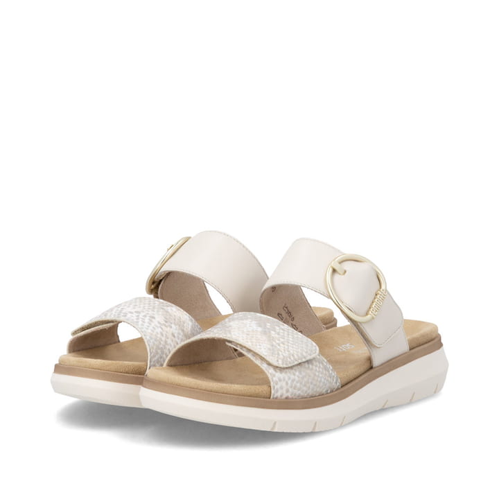 Mules remonte beiges pour femme D2K57-60 avec boucle tendance. Chaussures inclinées sur le côté.