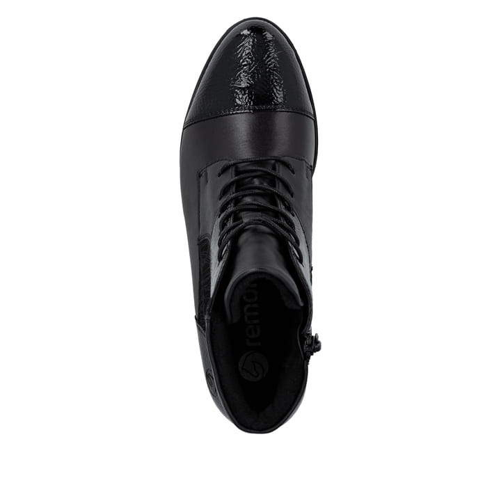Bottines remonte noires pour femme D6882-00 avec fermeture éclair. Semelle extérieure de la chaussure.