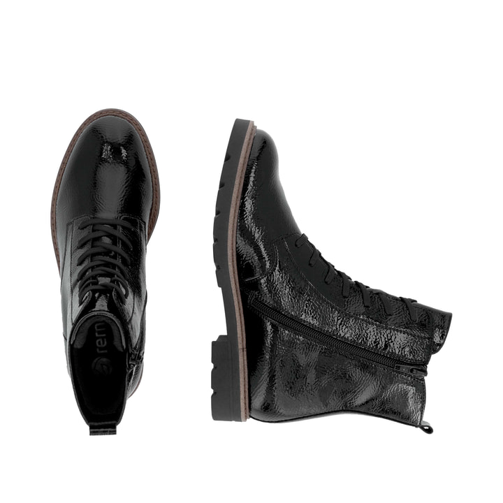 Schwarze remonte Damen Schnürstiefel D2Q71-03 mit einem Reißverschluss. Schuh von oben, liegend.