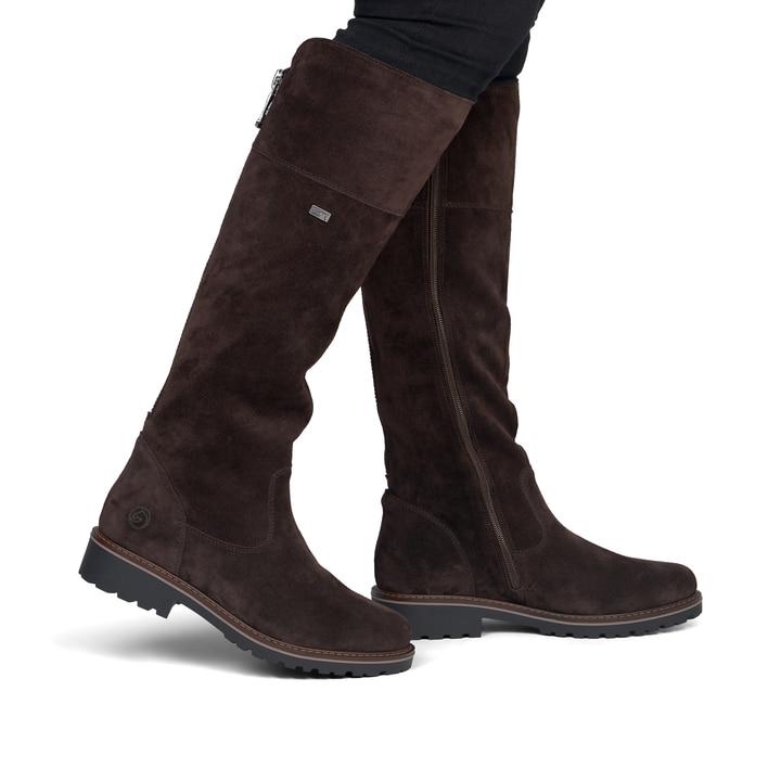 Dunkelbraune remonte Hochschaftstiefel R6581-25. Schuh am Fuß.