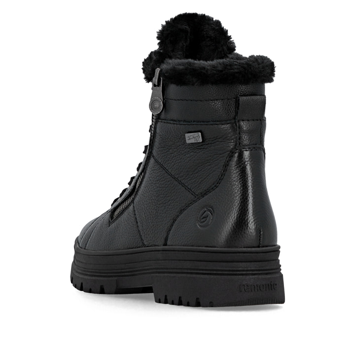 Schwarze remonte Damen Schnürstiefel D2U73-00 mit griffiger Glass-Fibre Sohle. Schuh von hinten.