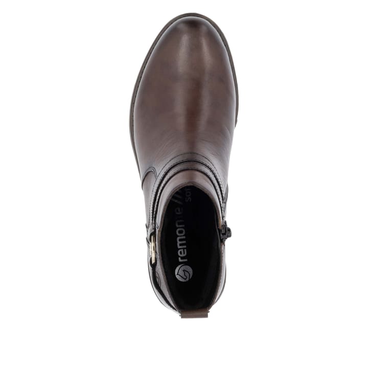 Bottines remonte marron pour femme D0F77-25 avec élément décoratif. Semelle extérieure de la chaussure.