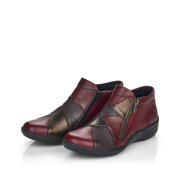 Bottines remonte rouges pour femmes R7674-36 avec fermeture éclair. Chaussures inclinées sur le côté.