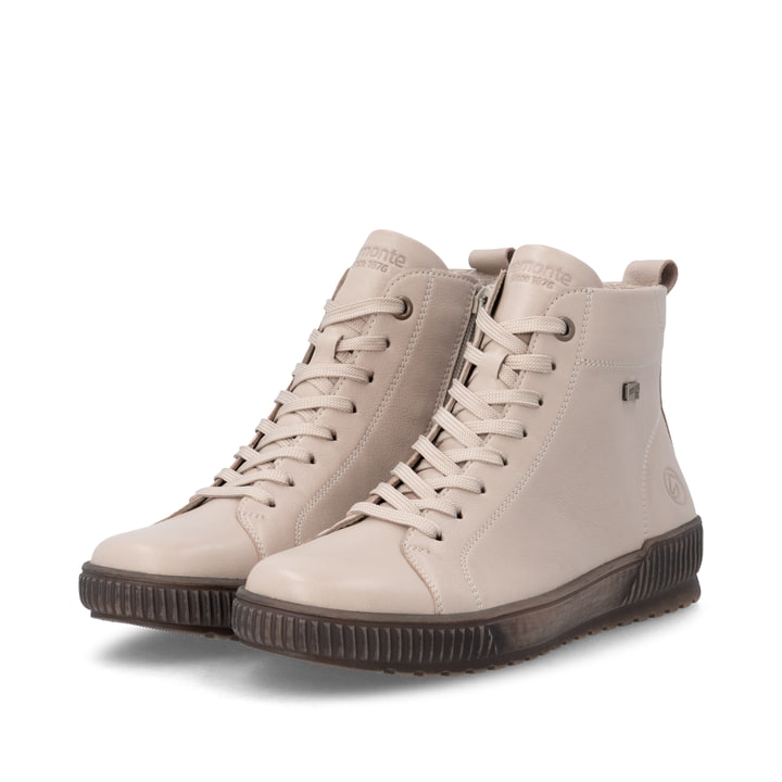 Bottes à lacets remonte beiges femmes D0782-62 avec membrane remonteTEX. Chaussures inclinées sur le côté.