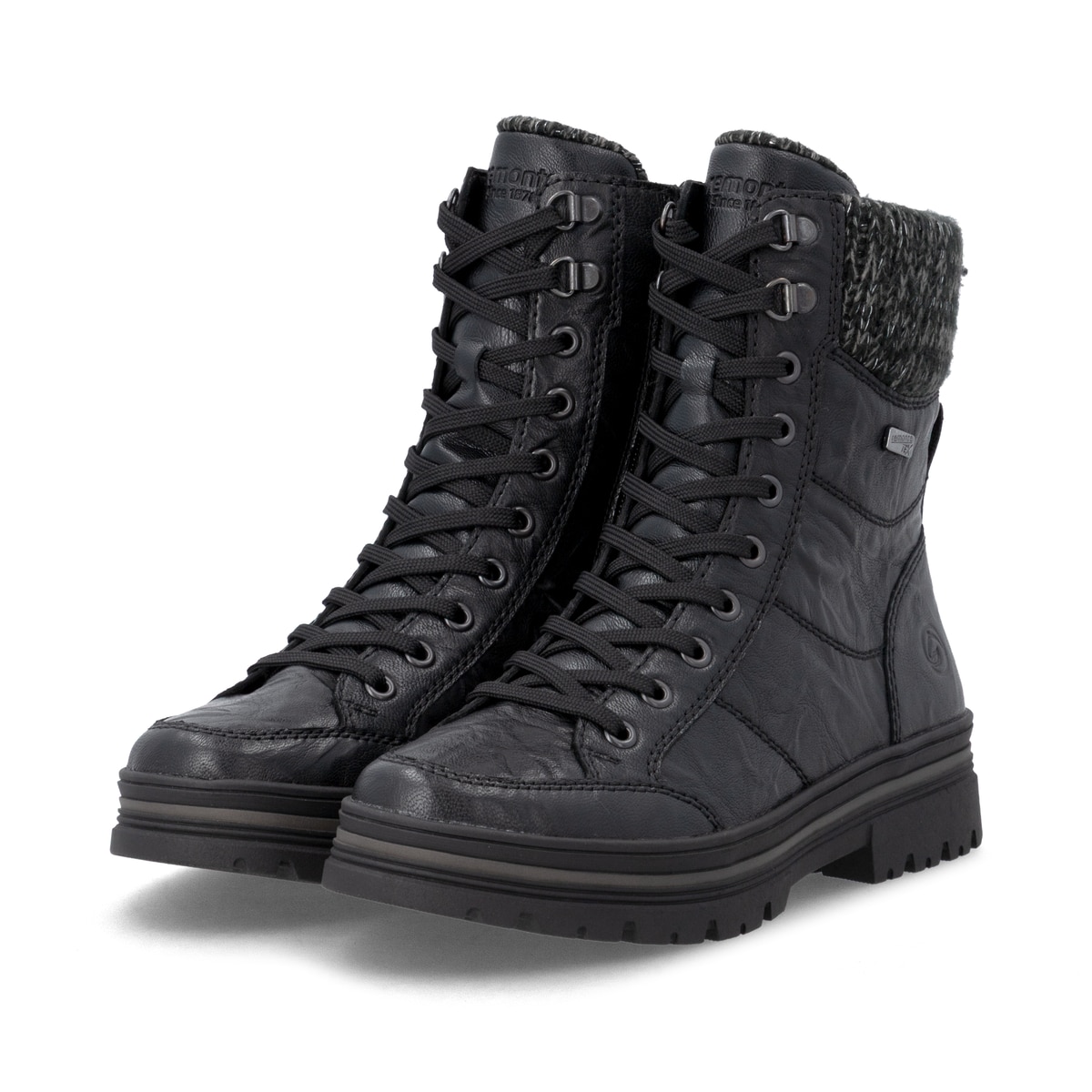 Schwarze remonte Damen Schnürstiefel D2U70-03 mit wasserabweisender TEX-Membran. Schuhpaar seitlich schräg.