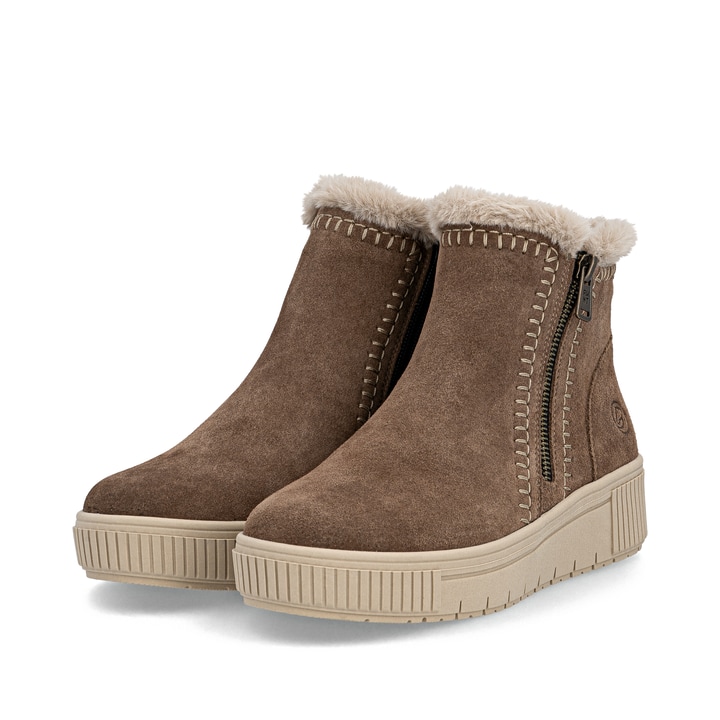 Braunbeige remonte Damen Kurzstiefel D3B70-20 mit weißer Zickzack-Naht. Schuhpaar seitlich schräg.