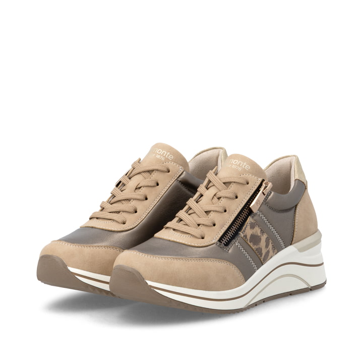 Baskets basses remonte métalliques végan pour femmes D0T09-92. Chaussures inclinées sur le côté.