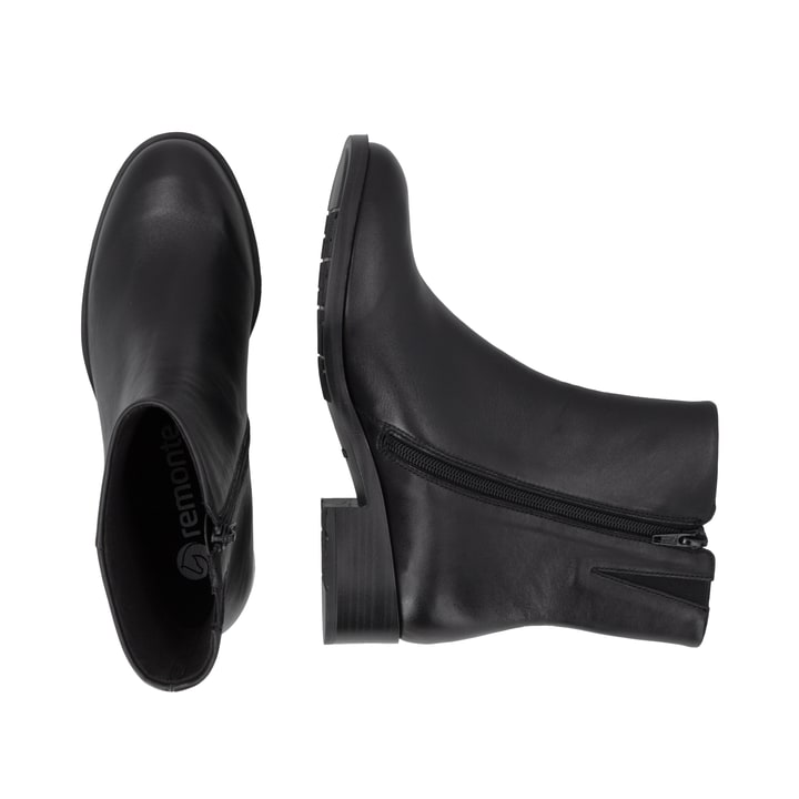 Schwarze remonte Damen Stiefeletten D3U73-00 mit einem Reißverschluss. Schuh von oben, liegend.