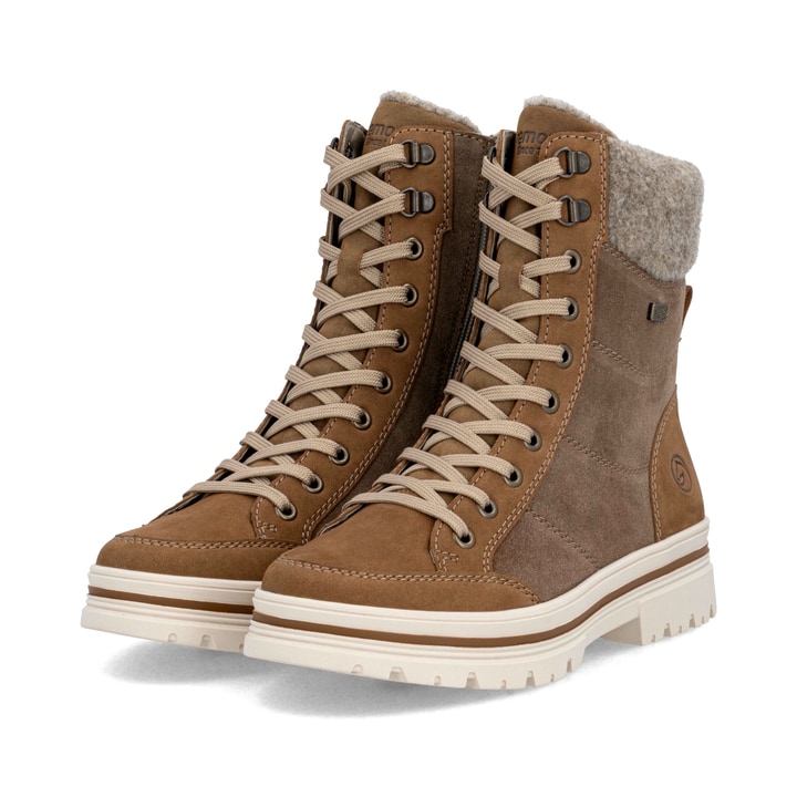 Braune remonte Damen Schnürstiefel D2U70-20 mit griffiger Glass-Fibre Sohle. Schuhpaar seitlich schräg.