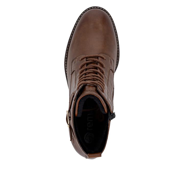 Bottines remonte marron pour femme D2A74-25 avec fermeture éclair. Semelle extérieure de la chaussure.