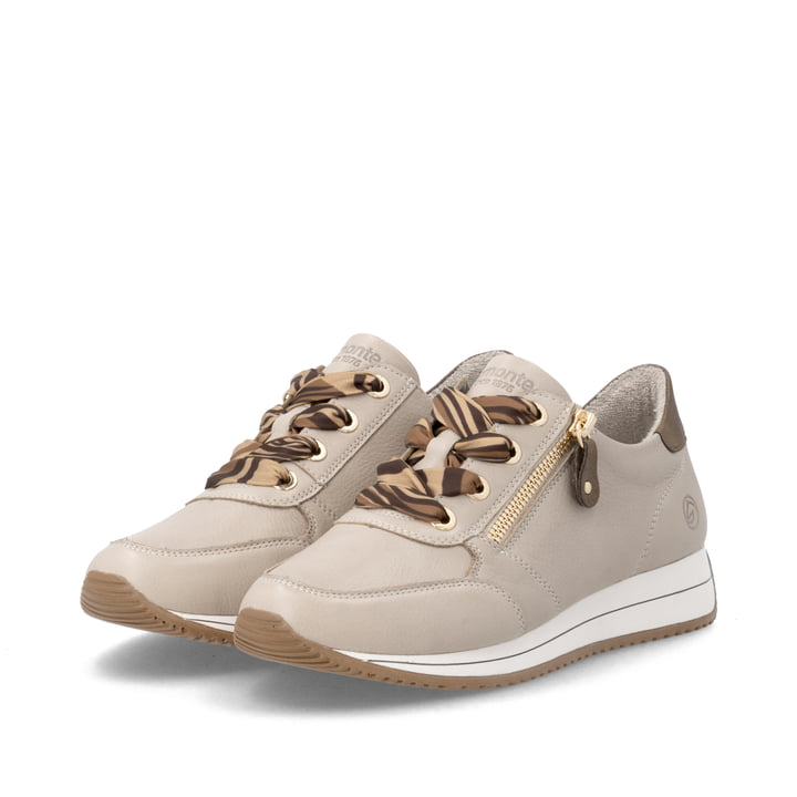 Baskets basses remonte beiges pour femmes D0H11-62 avec fermeture éclair. Chaussures inclinées sur le côté.