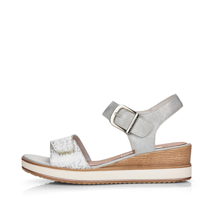 
Silberne remonte Damen Keilsandaletten D6455-90 mit Klettverschluss sowie Keilabsatz. Schuh Außenseite