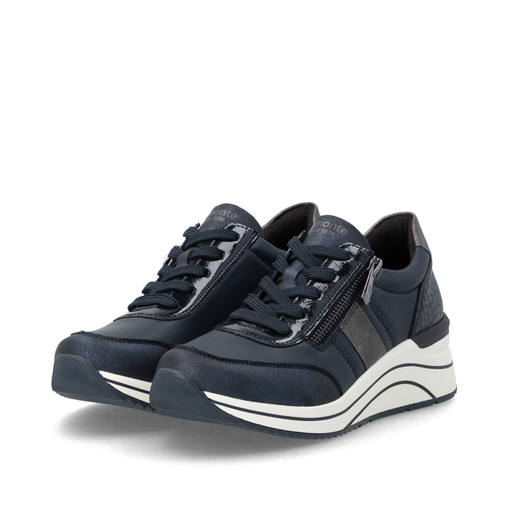 Vegane, dunkelblau-silberne remonte Damen Sneaker D0T09-14 mit Reißverschluss. Schuhpaar seitlich schräg.