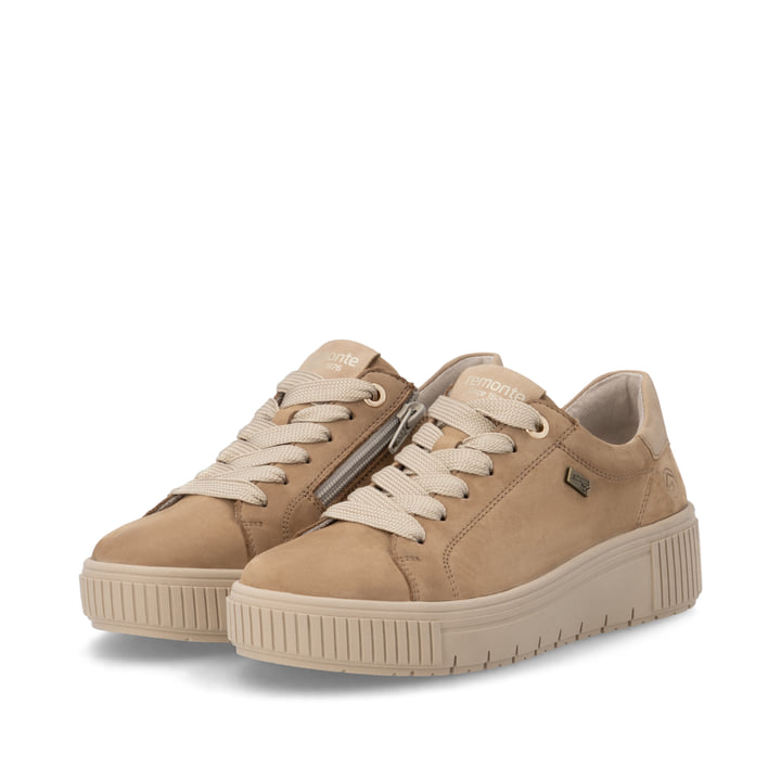 Baskets basses remonte marron femmes D3B00-20 avec membrane remonteTEX. Chaussures inclinées sur le côté.