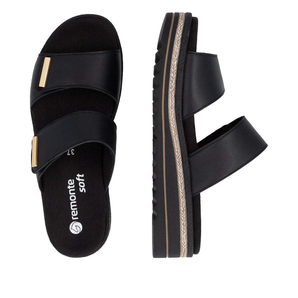 Mules remonte noires pour femme D0Q64-00 avec fermeture velcro. Chaussure vue de dessus, couchée.