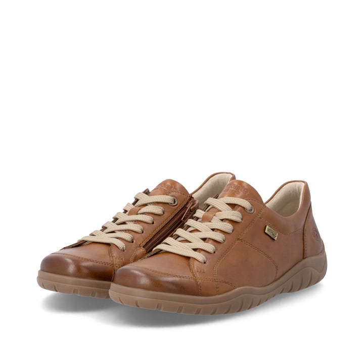 Chaussures à lacets remonte marron pour femmes D3T00-24. Chaussures inclinées sur le côté.