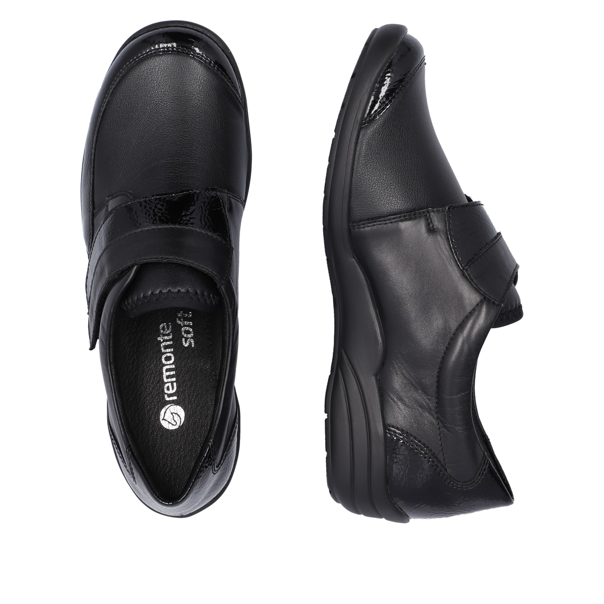 Schwarze remonte Damen Slipper R7600-04 mit Klettverschluss sowie Extraweite H. Schuh von oben, liegend.