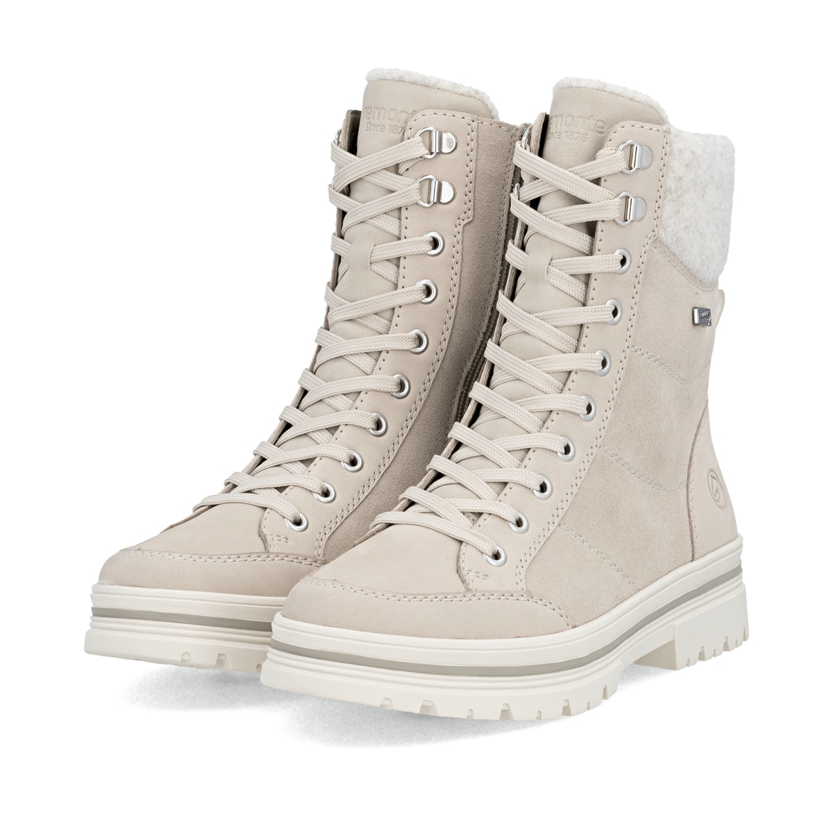 Beige remonte Damen Schnürstiefel D2U70-62 mit griffiger Glass-Fibre Sohle. Schuhpaar seitlich schräg.