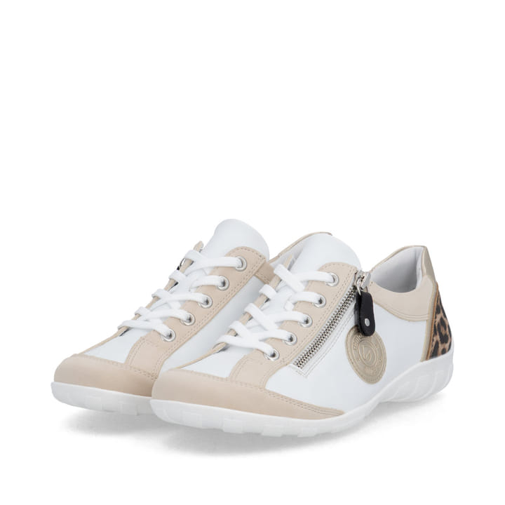 Chaussures à lacets remonte blanches vegan pour femme R3408-83. Chaussures inclinées sur le côté.