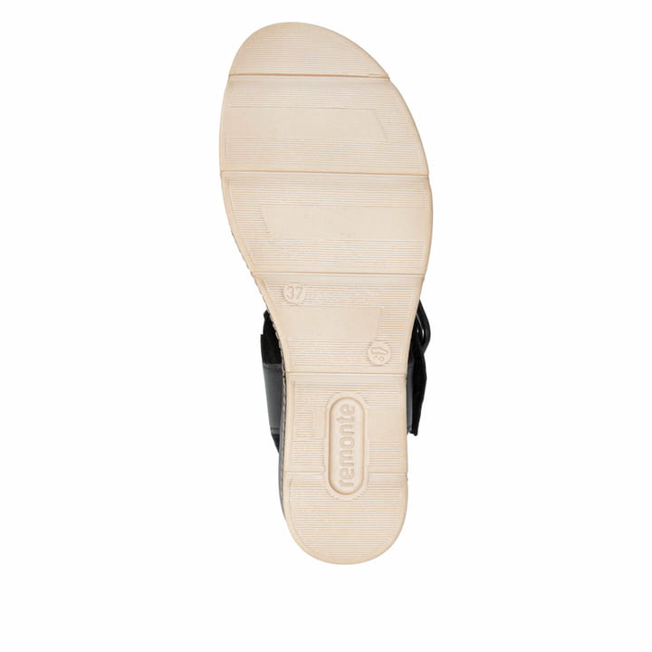 Schwarze remonte Keilsandaletten D2L53-03 mit angesagtem Animal-Print. Schuh Laufsohle.
