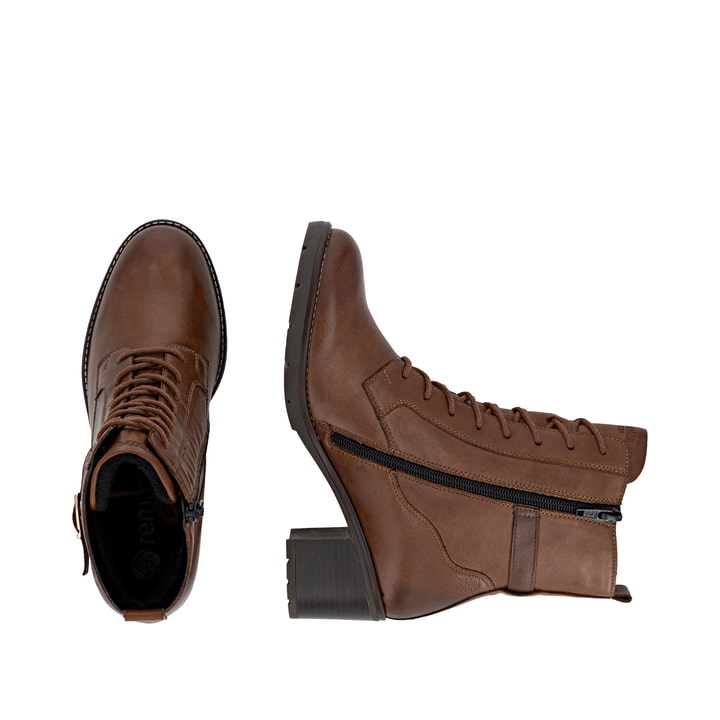 Braune remonte Damen Stiefeletten D2A74-25 mit einem Reißverschluss. Schuh von oben, liegend.