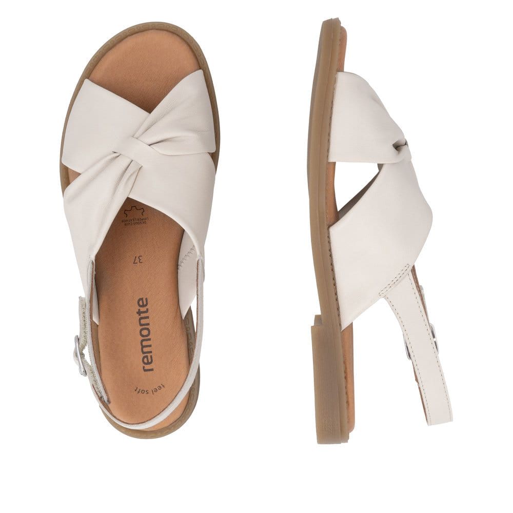 Beige remonte Riemchensandalen D3674-61 mit einem Klettverschluss. Schuh von oben, liegend.