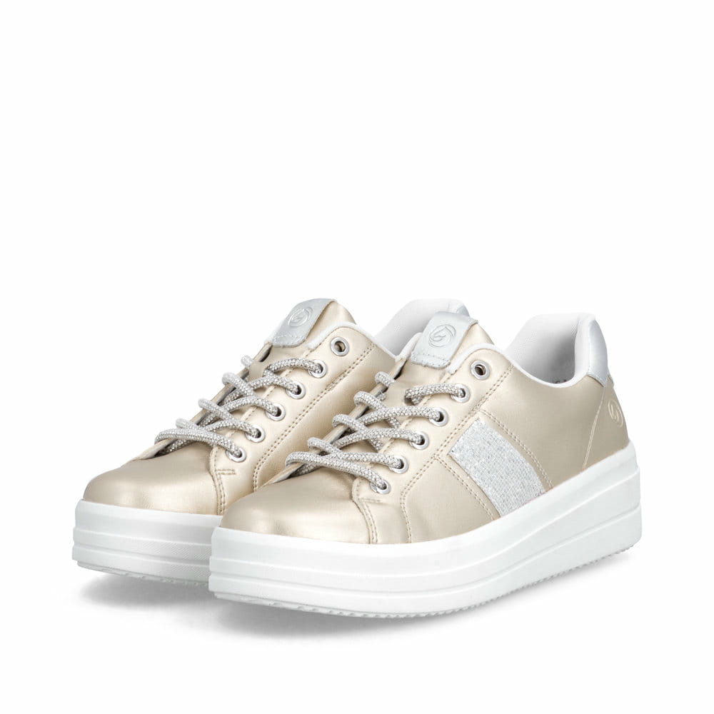Mocassins remonte métalliques femme D1C10-91 avec finition métallisée. Chaussures inclinées sur le côté.