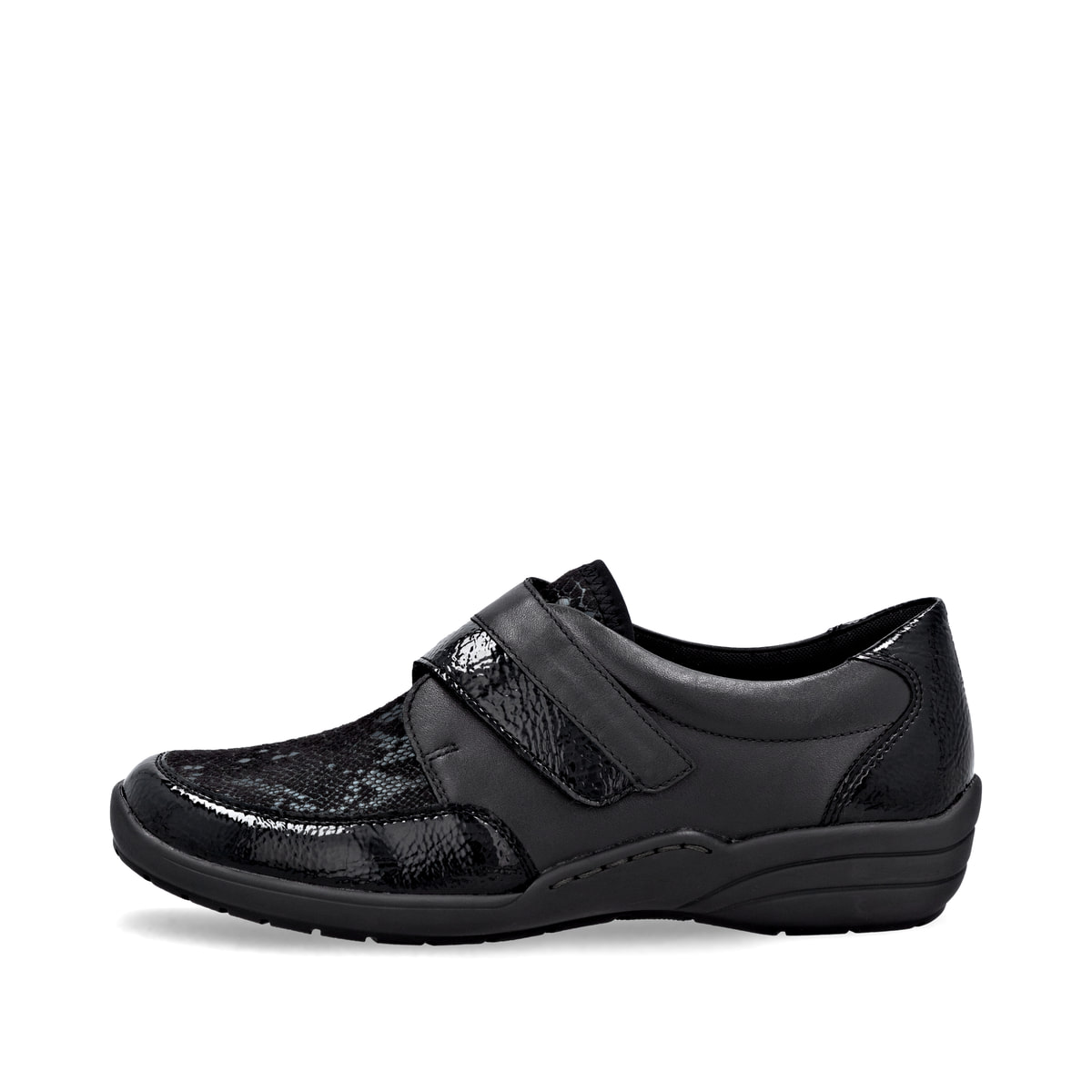 Mocassins remonte noirs pour femme R7600-00 avec fermeture velcro. Côté extérieur de la chaussure.