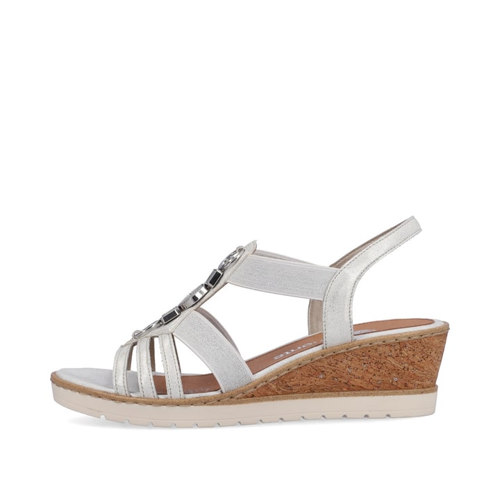 
Blütenweiße remonte Damen Keilsandaletten R6264-80 mit Elastikeinsatz sowie Keilabsatz. Schuh Außenseite
