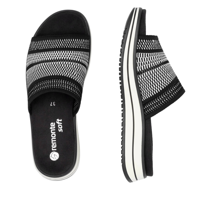 Schwarze remonte Damen Pantoletten D1J54-03 mit einem Gummizug. Schuh von oben, liegend.